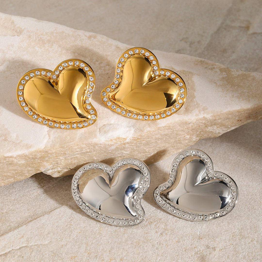 Boucles d'oreilles en or avec coeur de houx